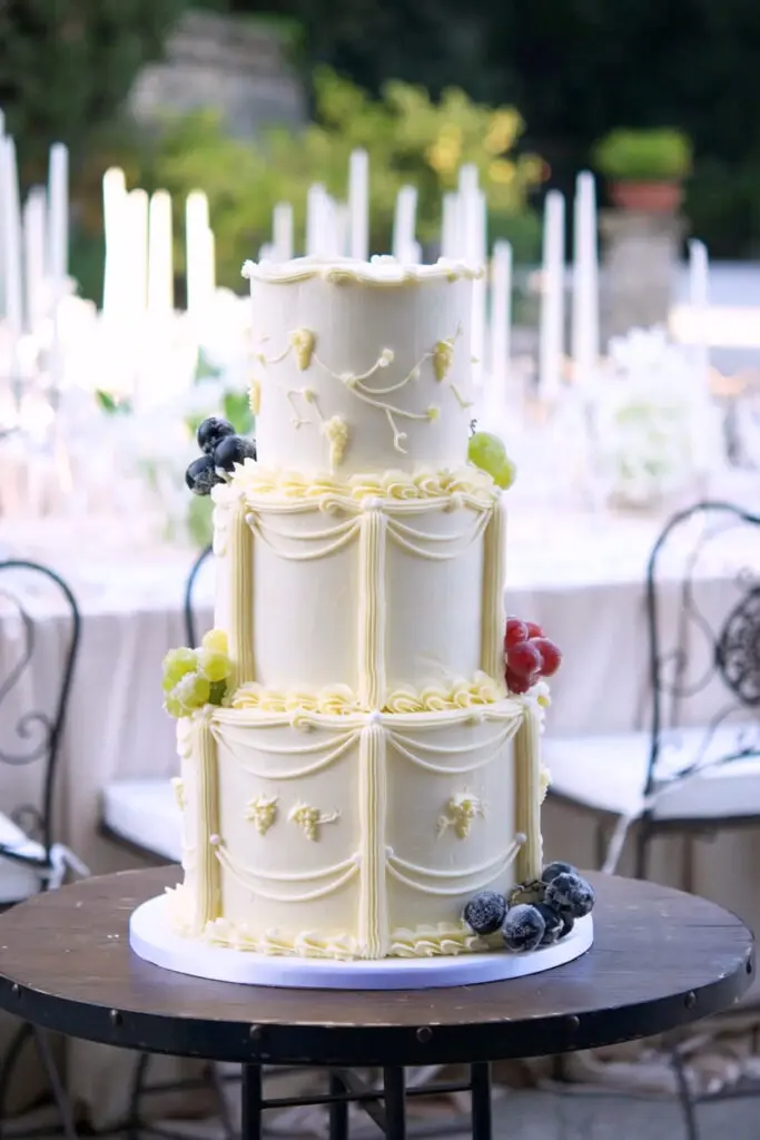 Piped vintage wedding cake with sugared grapes at La Baronia, Barcelona