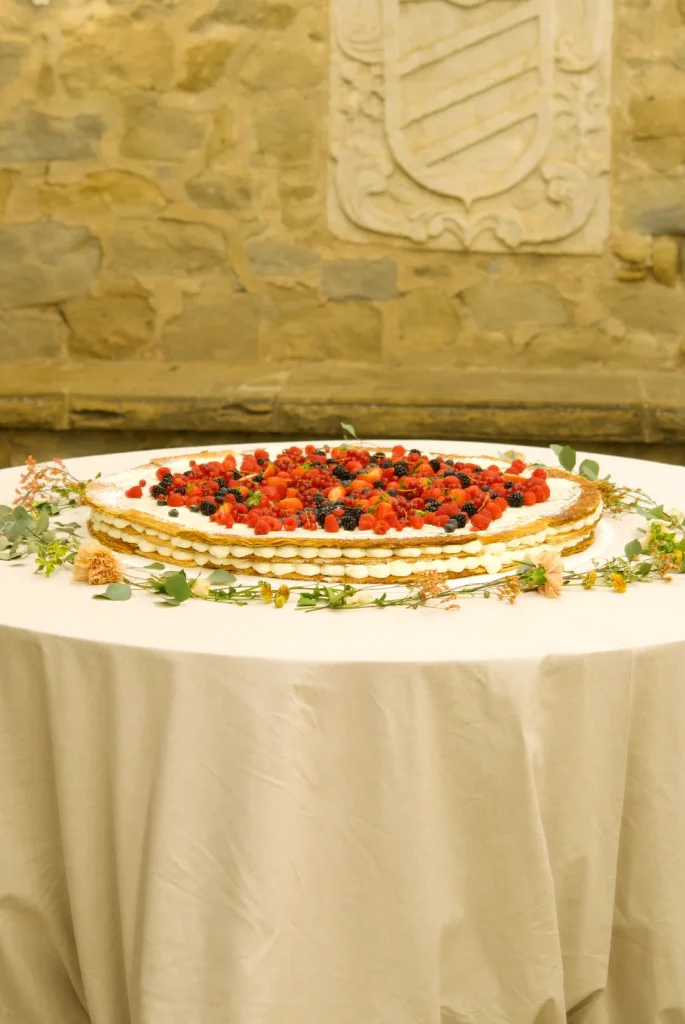 Millefoglie wedding cake with puff pastry, mascarpone cream and fresh berries at La Baronia, Barcelona