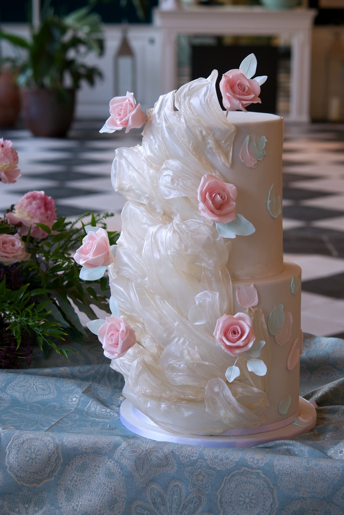 Ruffle and roses wedding cake