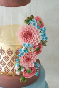 Blooms and velvet blush wedding cake