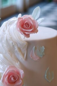 Ruffle and roses wedding cake