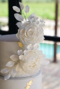White blooms wedding cake