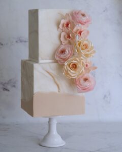 Natural marble and blooms wedding cake