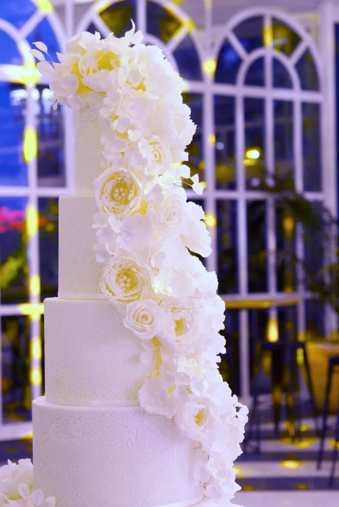 Six-tier wedding cake over one meter tall with edible lace by Mericakes