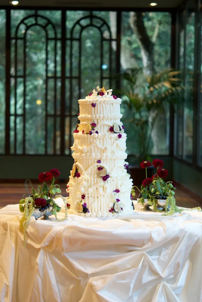 Maxi Vintage wedding cake with white and burgundy edible flowers
